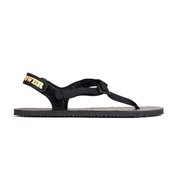 Alternate side view of the black sole Shamma Power Sandal.