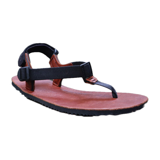 Limited Edition Numa Red Rock sandal with red leather footbed, on a white background