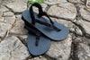 Shamma Chargers sandals on rocky ground