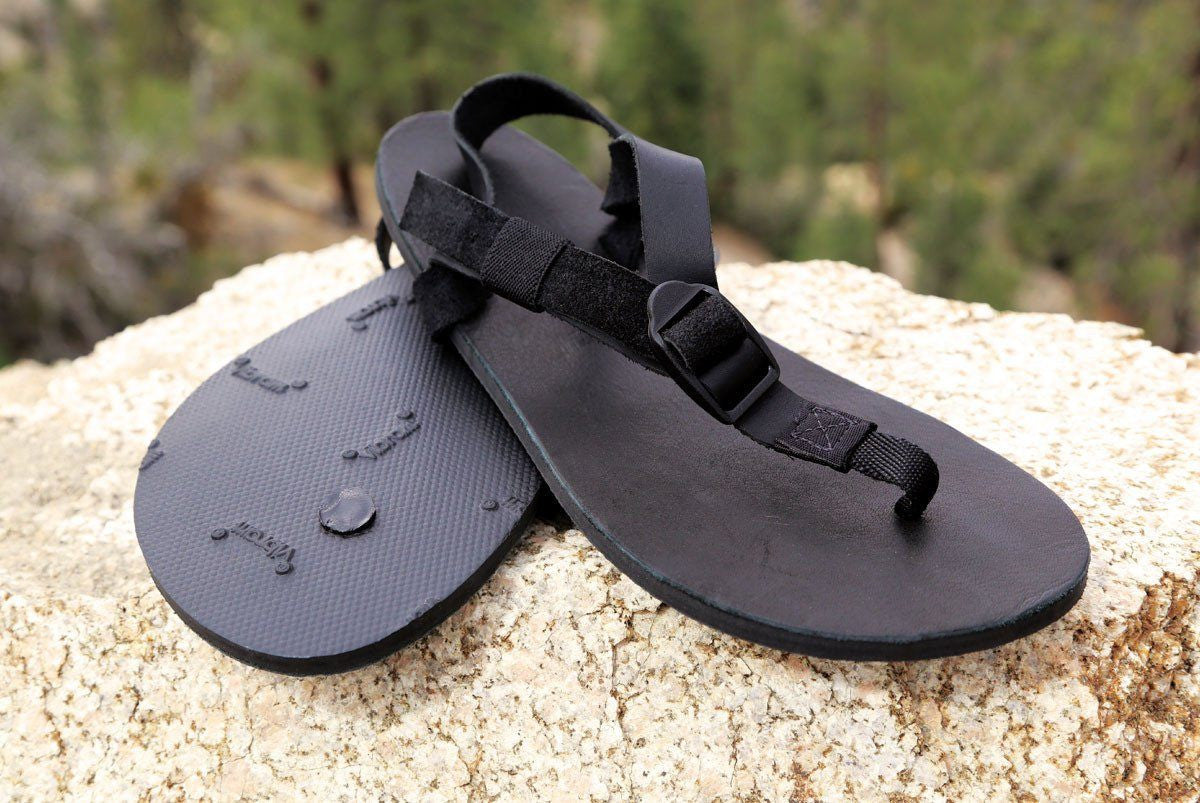 Shamma All Blacks Sandals Pair on Rocks