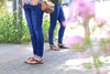 Women standing in All Browns sandals